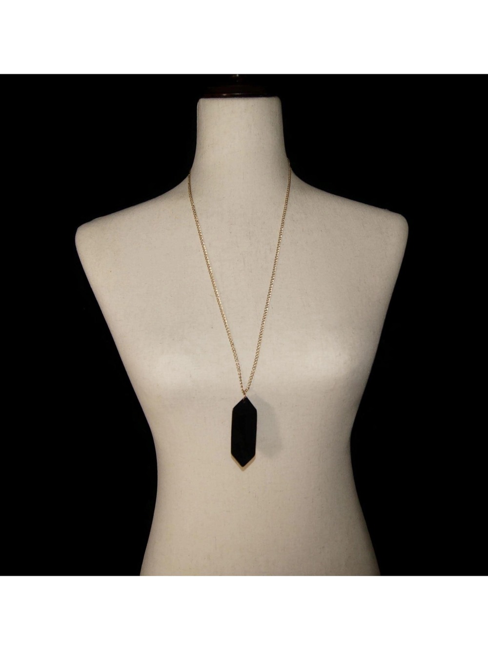 Vintage Black Plastic Pendant on 28" Gold Tone Chain with Lobster Claw Clasp.